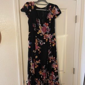 Women’s black floral dress, overlay skirt with romper bottoms